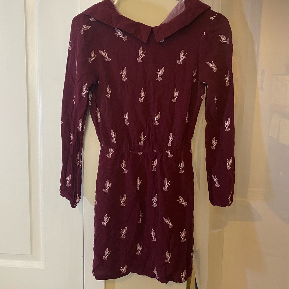 Burgundy bird collected top